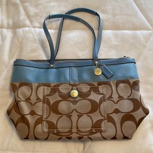 Coach purse with blue stripe